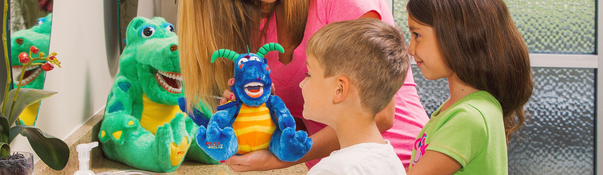 Teaching Your Kids to Floss Using Dentist Office Plush with Teeth